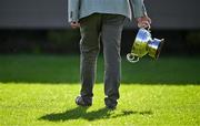 6 October 2024; The Fenagh Perpetual cup is taken away after a drawn game in the Leitrim County Senior Club Football Championship final match between Ballinamore Sean O'Heslins and Mohill at Ballinamore Sean O'Heslins GAA Club in Leitrim. Photo by Sam Barnes/Sportsfile
