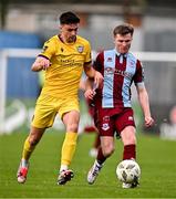 6 October 2024; Conor Kane of Drogheda United in action against Darragh Levingston of Wexford during the Sports Direct Men’s FAI Cup semi-final match between Drogheda United and Wexford at Weavers Park in Drogheda, Louth. Photo by Ben McShane/Sportsfile