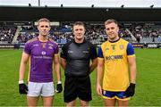 6 October 2024; From left, Paul Mannion of Kilmacud Crokes, referee Darren Delaney and Johnny Cooper of Na Fianna before the Dublin County Senior Club Football Championship semi-final match between Kilmacud Crokes and Na Fianna at Parnell Park in Dublin. Photo by Stephen Marken/Sportsfile