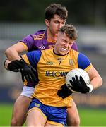 6 October 2024; Tom Brennan of Na Fianna in action against Paddy O'Connor of Kilmacud Crokes during the Dublin County Senior Club Football Championship semi-final match between Kilmacud Crokes and Na Fianna at Parnell Park in Dublin. Photo by Stephen Marken/Sportsfile