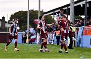 6 October 2024; Adam Foley of Drogheda United, 11, celebrates with teammates Darragh Markey, left, and Luke Heeney after scoring their side's first goal during the Sports Direct Men’s FAI Cup semi-final match between Drogheda United and Wexford at Weavers Park in Drogheda, Louth. Photo by Ben McShane/Sportsfile