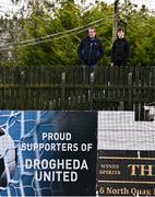 6 October 2024; Supporters watch on from a nearby rooftop during the Sports Direct Men’s FAI Cup semi-final match between Drogheda United and Wexford at Weavers Park in Drogheda, Louth. Photo by Ben McShane/Sportsfile