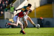6 October 2024; Eric Molloy of Rathvilly shoots to score his side's first goal despite the attempts of Jack Deacy of Palatine during the Carlow County Senior Football Championship final match between Rathvilly and Palatine at Netwatch Cullen Park in Carlow. Photo by Tom Beary/Sportsfile