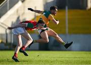 6 October 2024; Eric Molloy of Rathvilly shoots to score his side's first goal despite the attempts of Jack Deacy of Palatine during the Carlow County Senior Football Championship final match between Rathvilly and Palatine at Netwatch Cullen Park in Carlow. Photo by Tom Beary/Sportsfile