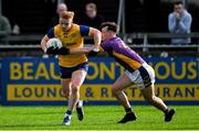 6 October 2024; Conor McHugh of Na Fianna in action against Michael Mullin of Kilmacud Crokes during the Dublin County Senior Club Football Championship semi-final match between Kilmacud Crokes and Na Fianna at Parnell Park in Dublin. Photo by Stephen Marken/Sportsfile