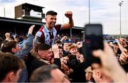 6 October 2024; Adam Foley of Drogheda United celebrates with supporters after the Sports Direct Men’s FAI Cup semi-final match between Drogheda United and Wexford at Weavers Park in Drogheda, Louth. Photo by Ben McShane/Sportsfile