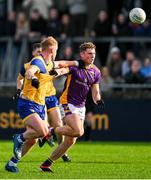 6 October 2024; Conor McHugh of Na Fianna in action against Mark O'Leary of Kilmacud Crokes during the Dublin County Senior Club Football Championship semi-final match between Kilmacud Crokes and Na Fianna at Parnell Park in Dublin. Photo by Stephen Marken/Sportsfile