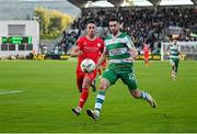 6 October 2024; Neil Farrugia of Shamrock Rovers in action against John O'Sullivan of Shelbourne during the SSE Airtricity Men's Premier Division match between Shamrock Rovers and Shelbourne at Tallaght Stadium in Dublin. Photo by Seb Daly/Sportsfile