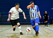 6 October 2024; Hughy Sweeney of Finn Harps in action against Jamie Linden of Dundalk during the FAI League of Ireland Down Syndrome Festival at the National Indoor Arena Futsal Courts in Dublin. Photo by Shauna Clinton/Sportsfile