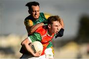 6 October 2024; Finbarr Kavanagh of Palatine is tackled by Eric Molloy of Rathvilly during the Carlow County Senior Football Championship final match between Rathvilly and Palatine at Netwatch Cullen Park in Carlow. Photo by Tom Beary/Sportsfile