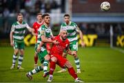 6 October 2024; Mark Coyle of Shelbourne in action against Dylan Watts of Shamrock Rovers during the SSE Airtricity Men's Premier Division match between Shamrock Rovers and Shelbourne at Tallaght Stadium in Dublin. Photo by Seb Daly/Sportsfile