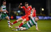 6 October 2024; John Martin of Shelbourne is tackled by Sean Hoare of Shamrock Rovers during the SSE Airtricity Men's Premier Division match between Shamrock Rovers and Shelbourne at Tallaght Stadium in Dublin. Photo by Seb Daly/Sportsfile