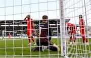 6 October 2024; Shelbourne players, including Mark Coyle, left, and goalkeeper Conor Kearns, 1, reacts to conceding a first goal during the SSE Airtricity Men's Premier Division match between Shamrock Rovers and Shelbourne at Tallaght Stadium in Dublin. Photo by Seb Daly/Sportsfile