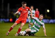 6 October 2024; John Martin of Shelbourne is tackled by Sean Hoare of Shamrock Rovers during the SSE Airtricity Men's Premier Division match between Shamrock Rovers and Shelbourne at Tallaght Stadium in Dublin. Photo by Seb Daly/Sportsfile