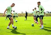 7 October 2024; Killian Phillips, left, and Sam Curtis during a Republic of Ireland Under 21 training session at the FAI National Training Centre in Dublin. Photo by Ramsey Cardy/Sportsfile