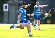 7 October 2024; Michael Milne warms up with a football during a Leinster rugby squad training session at UCD in Dublin. Photo by Piaras Ó Mídheach/Sportsfile