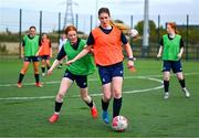 7 October 2024; Orlaith Maguire, right, in against against Sophie Byrne during the FAI/ Fingal Girls' TY Course at TUD in Blanchardstown, Dublin. Photo by Shauna Clinton/Sportsfile