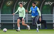 7 October 2024; Jamie McGrath and Andrew Omobamidele, rigth, during a Republic of Ireland training session at the FAI National Training Centre in Abbotstown, Dublin. Photo by Stephen McCarthy/Sportsfile