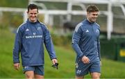 8 October 2024; Billy Burns, left, and Jack Crowley arrive for Munster rugby squad training at University of Limerick in Limerick. Photo by Brendan Moran/Sportsfile