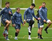 8 October 2024; Munster players, from left, Jack Crowley, Craig Casey, Conor Murray and Tadhg Beirne during rugby squad training at University of Limerick in Limerick. Photo by Brendan Moran/Sportsfile