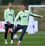 8 October 2024; Evan Ferguson, right, and Caoimhin Kelleher during a Republic of Ireland training session at the FAI National Training Centre in Abbotstown, Dublin. Photo by Stephen McCarthy/Sportsfile