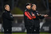 4 October 2024; Bohemians assistant manager Stephen O'Donnell with first team coach Derek Pender, right, and Alan Reynolds, left, during the Sports Direct Men’s FAI Cup semi-final match between Bohemians and Derry City at Dalymount Park in Dublin. Photo by Stephen McCarthy/Sportsfile