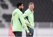 9 October 2024; Nathan Collins and Andrew Omobamidele, left, during a Republic of Ireland training session at the Helsinki Olympic Stadium in Helsinki, Finland. Photo by Stephen McCarthy/Sportsfile