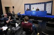 9 October 2024; Head coach Heimir Hallgrimsson with Nathan Collins and communications manager Kieran Crowley, left, during a Republic of Ireland press conference at the Helsinki Olympic Stadium in Helsinki, Finland. Photo by Stephen McCarthy/Sportsfile