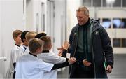 10 October 2024; Republic of Ireland head coach Heimir Hallgrimsson greets the mascots before the UEFA Nations League B Group 2 match between Finland and Republic of Ireland at the Helsinki Olympic Stadium in Helsinki, Finland. Photo by Stephen McCarthy/Sportsfile