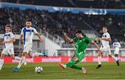 10 October 2024; Finn Azaz of Republic of Ireland has a shot on goal during the UEFA Nations League B Group 2 match between Finland and Republic of Ireland at the Helsinki Olympic Stadium in Helsinki, Finland. Photo by Stephen McCarthy/Sportsfile