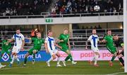 10 October 2024; Liam Scales of Republic of Ireland, left, scores his side's first goal during the UEFA Nations League B Group 2 match between Finland and Republic of Ireland at the Helsinki Olympic Stadium in Helsinki, Finland. Photo by Stephen McCarthy/Sportsfile