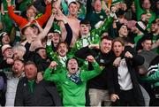 10 October 2024; Republic of Ireland supporters celebrate after Robbie Brady scored their winning goal during the UEFA Nations League B Group 2 match between Finland and Republic of Ireland at the Helsinki Olympic Stadium in Helsinki, Finland. Photo by Stephen McCarthy/Sportsfile