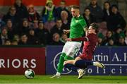 11 October 2024; Sam Curtis of Republic of Ireland in action against Mathias Fjortoft Lovik of Norway during the UEFA European U21 Championship qualifier match between Republic of Ireland and Norway at Turner's Cross in Cork. Photo by Brendan Moran/Sportsfile