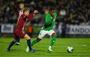 11 October 2024; Aidomo Emakhu of Republic of Ireland in action against Isak Hansen-Aaroen of Norway during the UEFA European U21 Championship qualifier match between Republic of Ireland and Norway at Turner's Cross in Cork. Photo by Brendan Moran/Sportsfile
