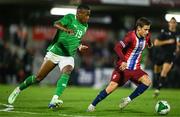 11 October 2024; Oliver Braude of Norway in action against Aidomo Emakhu of Republic of Ireland during the UEFA European U21 Championship qualifier match between Republic of Ireland and Norway at Turner's Cross in Cork. Photo by Brendan Moran/Sportsfile