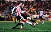 11 October 2024; Paul McMullan of Derry City in action against Paddy Kirk of Bohemians during the SSE Airtricity Men's Premier Division match between Derry City and Bohemians at The Ryan McBride Brandywell Stadium in Derry. Photo by Ramsey Cardy/Sportsfile