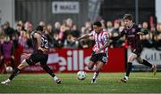 11 October 2024; Sean Robertson of Derry City in action against Jake Carroll, left, and Paddy Kirk of Bohemians during the SSE Airtricity Men's Premier Division match between Derry City and Bohemians at The Ryan McBride Brandywell Stadium in Derry. Photo by Ramsey Cardy/Sportsfile