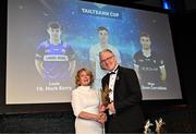 11 October 2024; Breege Carrabine accepts the 2024 Tailteann Cup Team of the Year award on behalf of her son Sligo footballer Sean Carrabine from Uachtarán Chumann Lúthchleas Gael Jarlath Burns during the GAA Champion 15 Awards ceremony at Croke Park in Dublin. Photo by Sam Barnes/Sportsfile