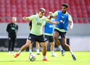 12 October 2024; Jayson Molumby and Andrew Omobamidele, right, during a Republic of Ireland training session at the Georgios Karaiskakis Football Stadium in Piraeus, Greece. Photo by Stephen McCarthy/Sportsfile