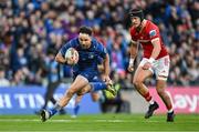 12 October 2024; Hugo Keenan of Leinster runs in past Mike Haley of Munster to score his side's third try during the United Rugby Championship match between Leinster and Munster at Croke Park in Dublin. Photo by Brendan Moran/Sportsfile