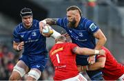 12 October 2024; RG Snyman of Leinster is tackled by Jeremy Loughman and Jean Kleyn of Munster during the United Rugby Championship match between Leinster and Munster at Croke Park in Dublin. Photo by Brendan Moran/Sportsfile