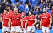 12 October 2024; Munster players including Jeremy Loughman, third from left, react after conceding a first try during the United Rugby Championship match between Leinster and Munster at Croke Park in Dublin. Photo by Sam Barnes/Sportsfile