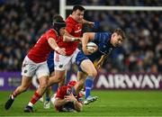12 October 2024; Garry Ringrose of Leinster is tackled by Niall Scannell and John Hodnett and Mike Haley of Munster during the United Rugby Championship match between Leinster and Munster at Croke Park in Dublin. Photo by Brendan Moran/Sportsfile