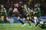 12 October 2024; John Cooney of Ulster evades the tackle of Mack Hansen of Connacht on his way to scoring his side's third try during the United Rugby Championship match between Ulster v Connacht at Kingspan Stadium in Belfast. Photo by Ramsey Cardy/Sportsfile