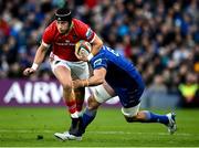 12 October 2024; Mike Haley of Munster is tackled by Jack Conan of Leinster during the United Rugby Championship match between Leinster and Munster at Croke Park in Dublin. Photo by Seb Daly/Sportsfile
