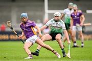 13 October 2024; Oisín O'Rorke of Kilmacud Crokes in action against Colm Walsh of Lucan Sarsfields during the Dublin County Senior Club Hurling Championship semi-final match between Kilmacud Crokes and Lucan Sarsfields at Parnell Park in Dublin. Photo by Piaras Ó Mídheach/Sportsfile
