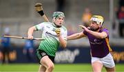 13 October 2024; Seán Harkness of Lucan Sarsfields in action against Mark Grogan of Kilmacud Crokes during the Dublin County Senior Club Hurling Championship semi-final match between Kilmacud Crokes and Lucan Sarsfields at Parnell Park in Dublin. Photo by Piaras Ó Mídheach/Sportsfile