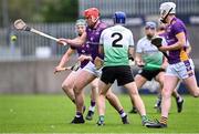 13 October 2024; Alex Considine of Kilmacud Crokes in action against Cathal Stritch of Lucan Sarsfields during the Dublin County Senior Club Hurling Championship semi-final match between Kilmacud Crokes and Lucan Sarsfields at Parnell Park in Dublin. Photo by Piaras Ó Mídheach/Sportsfile