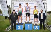 13 October 2024; U20 men's top finishers Sean Quinn of Dundrum South Dublin AC, first, Noah Harris of Parnell AC, Wicklow, second, and Lughaidh Mallon of Lagan Valley AC, Antrim, third, with Athletics Ireland president John Cronin, left, and Mayor of Fingal Councillor Brian McDonagh, right, during the Autumn Open International Cross Country Festival and National Juvenile Relays at the Sport Ireland National Cross Country Track in Abbotstown, Dublin. Photo by Seb Daly/Sportsfile