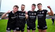 13 October 2024; Kilcoo players, from left, Sean Og McCusker, Conor Laverty, Nathan Rogers and Shealan Johnston celebrate after their side's victory in the Down County Senior Club Football Championship final match between Burren and Kilcoo at Pairc Esler in Newry, Down. Photo by Shauna Clinton/Sportsfile